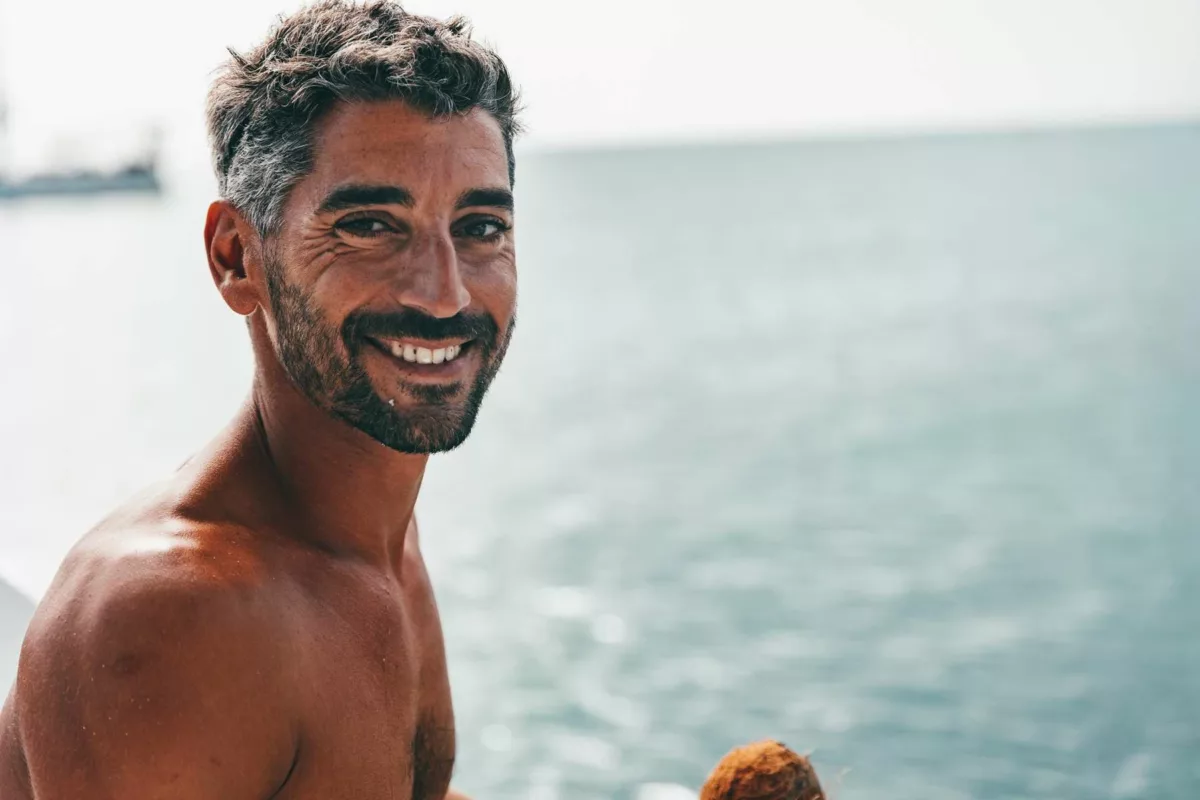 happy guy in the caribbean island