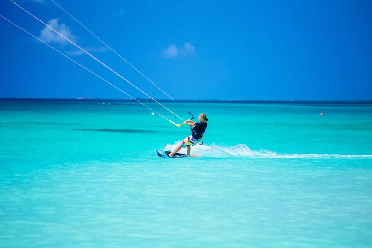 kiter in antigua spot with crystal clear water